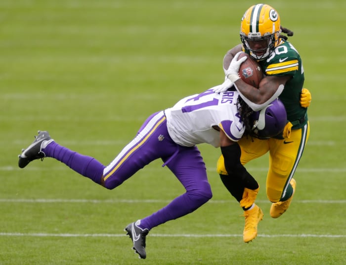 anthony-harris-tackling-jamaal-williams